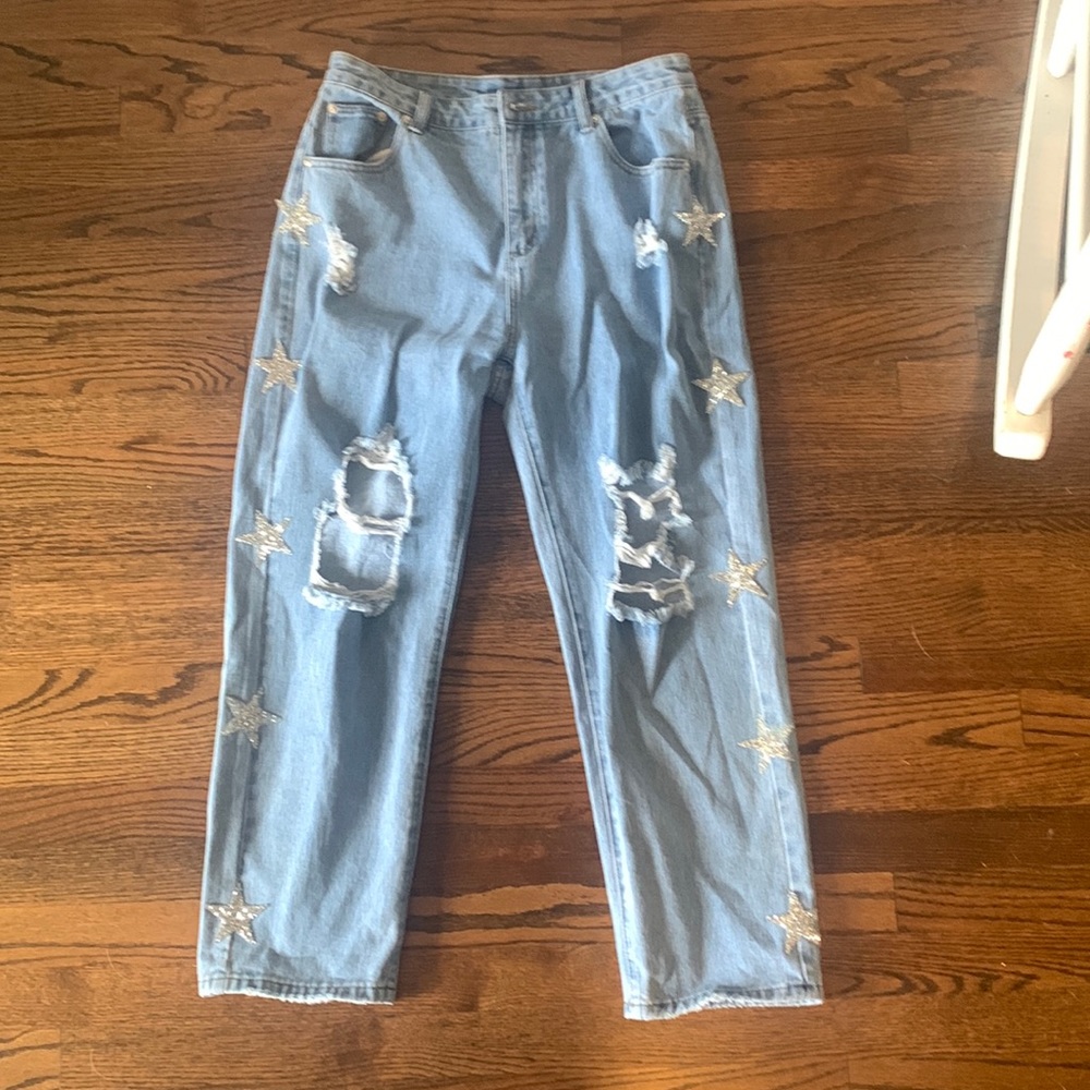 Shein ripped jeans with silver stars on the size, size large